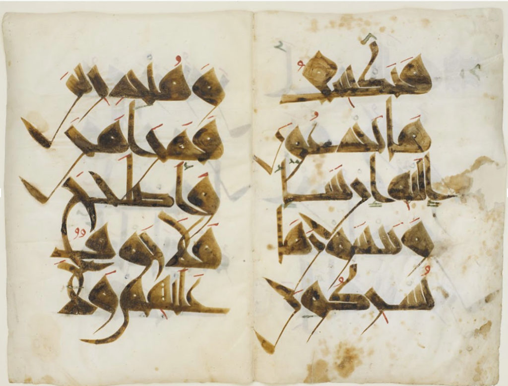 A two-page manuscript displays parts of Qur'anic verses (with no dots) with five lines on each page in a brown-yellow Qairouany Kufic script. The manuscript is beige and contains brown-orange stains.