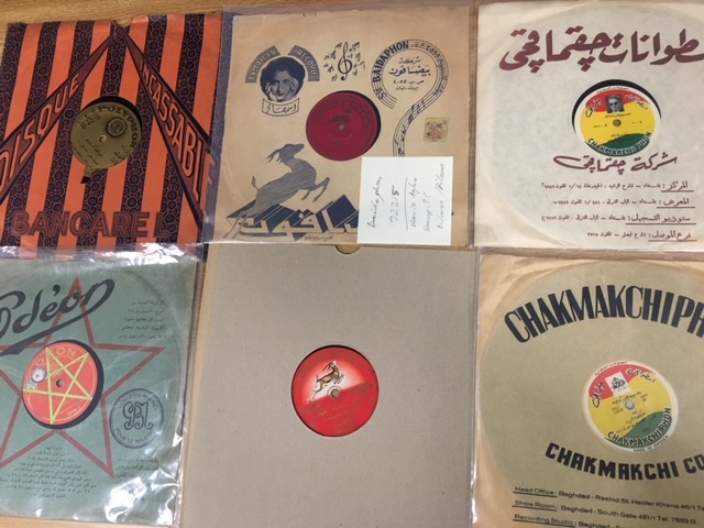 Six records and their sleeves