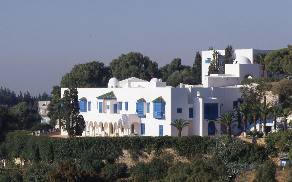 White palace with blue details. 