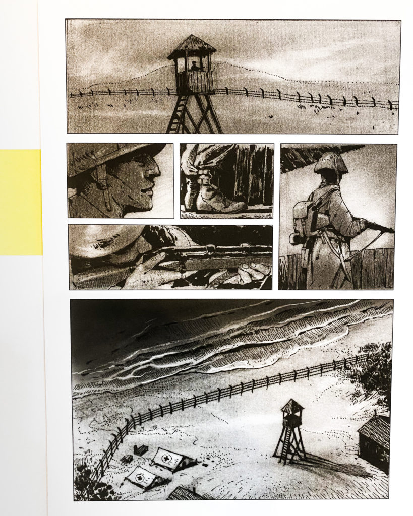 Grey-scale comic panels showing  a guard on a beach in a small hut. 