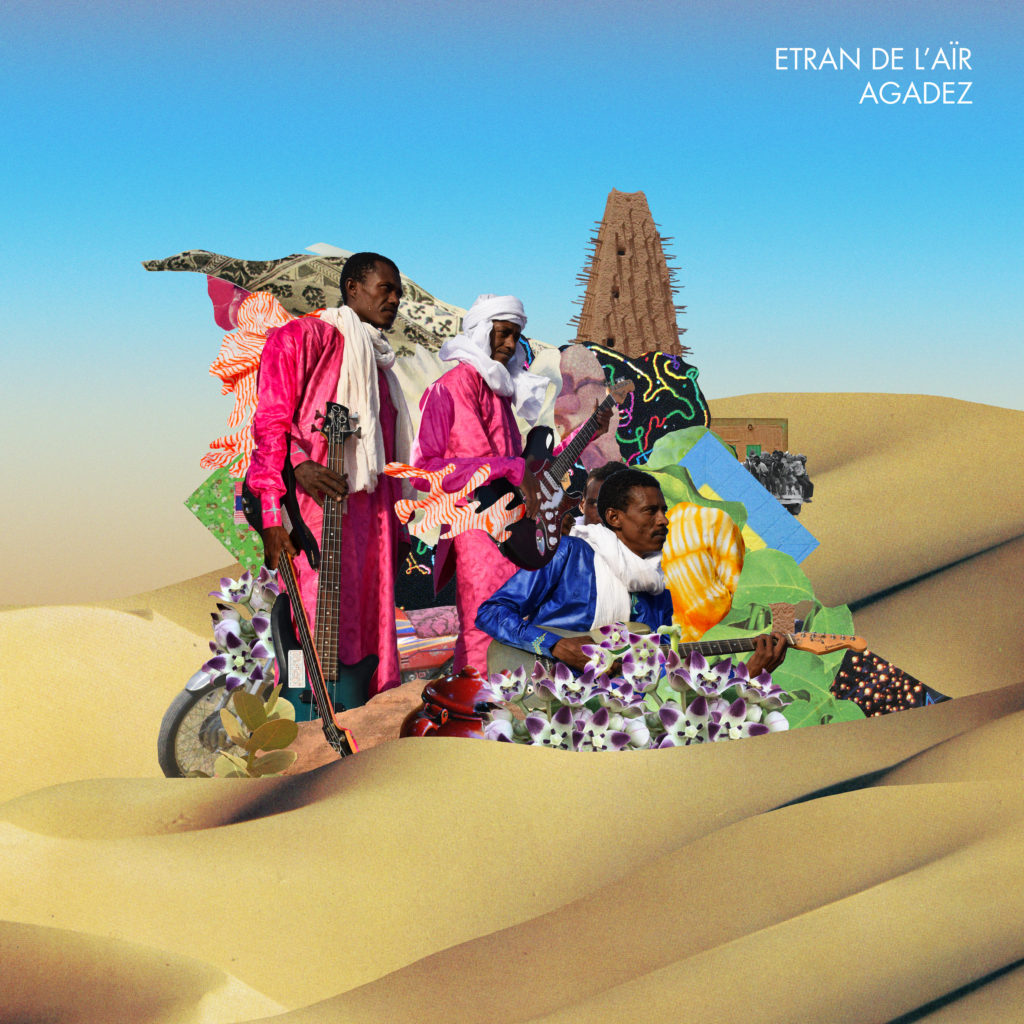 A collage shows three black men wearing pink and blue tagelmust, traditional Tuareg clothing. They are holding guitars and they are enwrapped in a colorful collage of flowers and prints. They are in the middle of a beige desert, with a mosque visible behind them.  